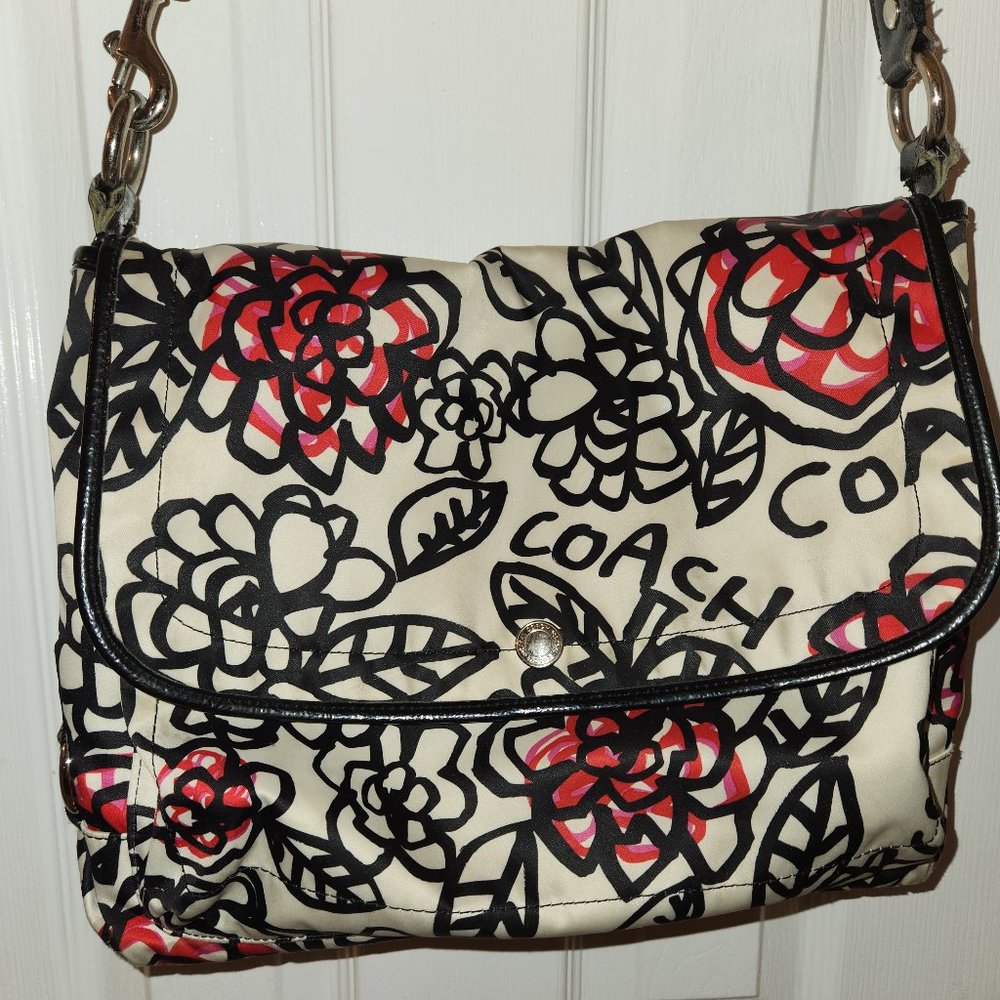 Coach Poppy Black White and Pink pre-owned purse that is colorful and fun!
